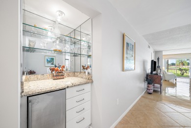 Experience serene living in this inviting 3-bedroom end-unit on  in Florida - for sale on GolfHomes.com, golf home, golf lot