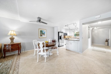 Experience serene living in this inviting 3-bedroom end-unit on  in Florida - for sale on GolfHomes.com, golf home, golf lot