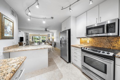 Experience serene living in this inviting 3-bedroom end-unit on  in Florida - for sale on GolfHomes.com, golf home, golf lot