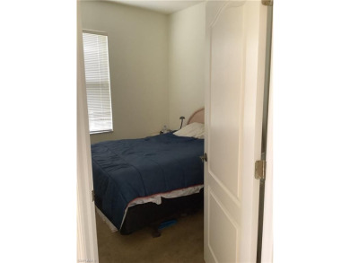 Looking for a light and airy comfortable unit to call home, well on Hammock Bay in Florida - for sale on GolfHomes.com, golf home, golf lot