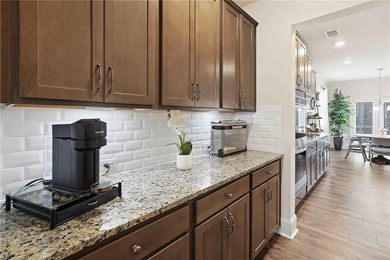 Located in the sought-after Georgian subdivision, this beautiful on The Frog Golf Club in Georgia - for sale on GolfHomes.com, golf home, golf lot