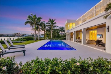 Experience the best of luxury living in this waterfront coastal on Sailfish Point Golf Club, Inc. in Florida - for sale on GolfHomes.com, golf home, golf lot