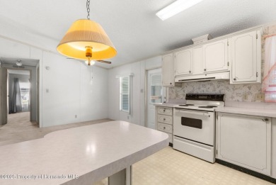 Welcome to this charming 2-BEDROOM, 2-BATHROOM, offering 1,178 on Brookridge Country Club in Florida - for sale on GolfHomes.com, golf home, golf lot