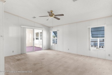 Welcome to this charming 2-BEDROOM, 2-BATHROOM, offering 1,178 on Brookridge Country Club in Florida - for sale on GolfHomes.com, golf home, golf lot