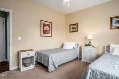 Experience coastal living at its finest in this meticulously on Crow Creek Golf Club in North Carolina - for sale on GolfHomes.com, golf home, golf lot