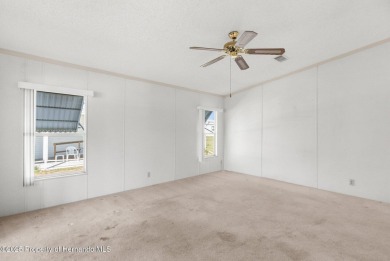 Welcome to this charming 2-BEDROOM, 2-BATHROOM, offering 1,178 on Brookridge Country Club in Florida - for sale on GolfHomes.com, golf home, golf lot