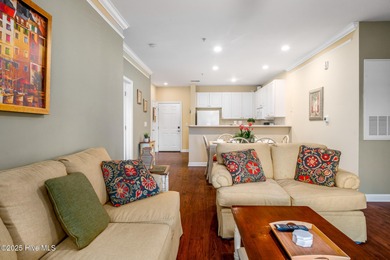 Experience coastal living at its finest in this meticulously on Crow Creek Golf Club in North Carolina - for sale on GolfHomes.com, golf home, golf lot