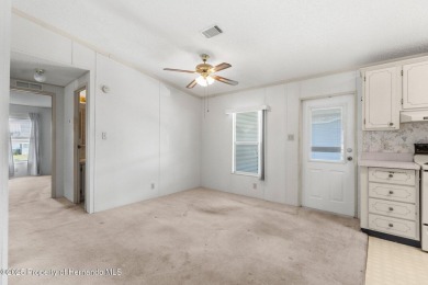 Welcome to this charming 2-BEDROOM, 2-BATHROOM, offering 1,178 on Brookridge Country Club in Florida - for sale on GolfHomes.com, golf home, golf lot