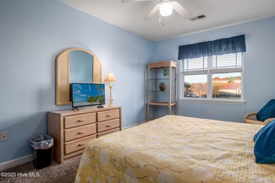 Experience coastal living at its finest in this meticulously on Crow Creek Golf Club in North Carolina - for sale on GolfHomes.com, golf home, golf lot