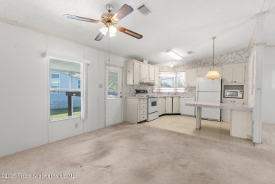 Welcome to this charming 2-BEDROOM, 2-BATHROOM, offering 1,178 on Brookridge Country Club in Florida - for sale on GolfHomes.com, golf home, golf lot