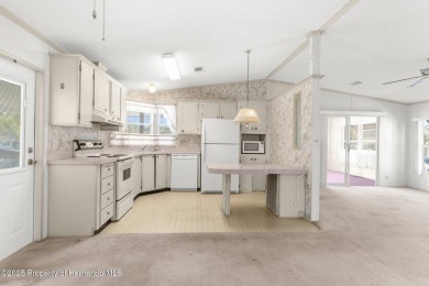 Welcome to this charming 2-BEDROOM, 2-BATHROOM, offering 1,178 on Brookridge Country Club in Florida - for sale on GolfHomes.com, golf home, golf lot