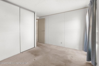 Welcome to this charming 2-BEDROOM, 2-BATHROOM, offering 1,178 on Brookridge Country Club in Florida - for sale on GolfHomes.com, golf home, golf lot