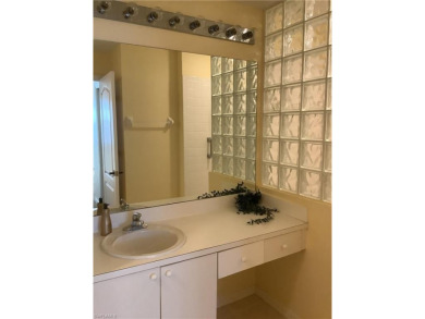Price improvement on this 3BR/2BA spacious Condo - 1276 Sq Ft - on Hammock Bay in Florida - for sale on GolfHomes.com, golf home, golf lot