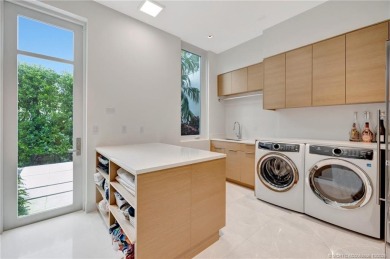 Experience the best of luxury living in this waterfront coastal on Sailfish Point Golf Club, Inc. in Florida - for sale on GolfHomes.com, golf home, golf lot