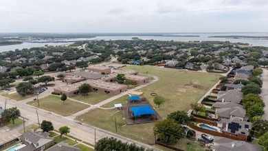 Elegantly updated home located on a spacious corner lot in the on Stewart Peninsula Golf Course in Texas - for sale on GolfHomes.com, golf home, golf lot