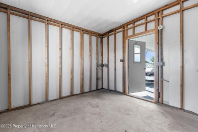 Welcome to this charming 2-BEDROOM, 2-BATHROOM, offering 1,178 on Brookridge Country Club in Florida - for sale on GolfHomes.com, golf home, golf lot