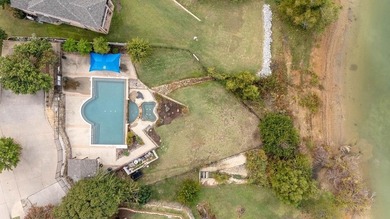 Elegantly updated home located on a spacious corner lot in the on Stewart Peninsula Golf Course in Texas - for sale on GolfHomes.com, golf home, golf lot