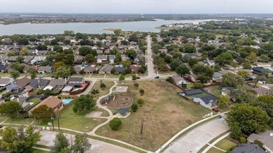 Elegantly updated home located on a spacious corner lot in the on Stewart Peninsula Golf Course in Texas - for sale on GolfHomes.com, golf home, golf lot