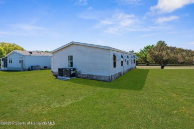 Welcome to this charming 2-BEDROOM, 2-BATHROOM, offering 1,178 on Brookridge Country Club in Florida - for sale on GolfHomes.com, golf home, golf lot