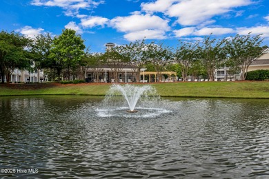 Experience coastal living at its finest in this meticulously on Crow Creek Golf Club in North Carolina - for sale on GolfHomes.com, golf home, golf lot