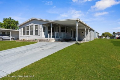 Welcome to this charming 2-BEDROOM, 2-BATHROOM, offering 1,178 on Brookridge Country Club in Florida - for sale on GolfHomes.com, golf home, golf lot