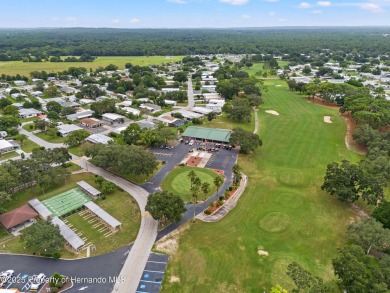 Welcome to this charming 2-BEDROOM, 2-BATHROOM, offering 1,178 on Brookridge Country Club in Florida - for sale on GolfHomes.com, golf home, golf lot