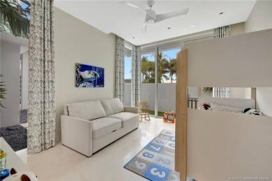 Experience the best of luxury living in this waterfront coastal on Sailfish Point Golf Club, Inc. in Florida - for sale on GolfHomes.com, golf home, golf lot