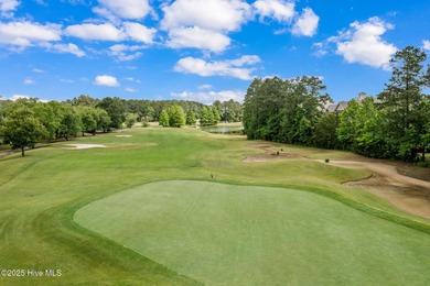 Experience coastal living at its finest in this meticulously on Crow Creek Golf Club in North Carolina - for sale on GolfHomes.com, golf home, golf lot