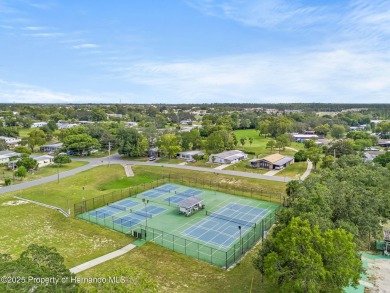Welcome to this charming 2-BEDROOM, 2-BATHROOM, offering 1,178 on Brookridge Country Club in Florida - for sale on GolfHomes.com, golf home, golf lot