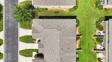 Enjoy low-maintenance living in this end unit two-story townhome on Golf Club At Fleming Island in Florida - for sale on GolfHomes.com, golf home, golf lot