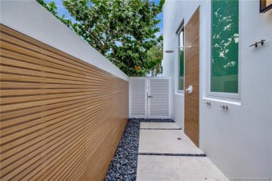 Experience the best of luxury living in this waterfront coastal on Sailfish Point Golf Club, Inc. in Florida - for sale on GolfHomes.com, golf home, golf lot