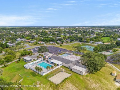 Welcome to this charming 2-BEDROOM, 2-BATHROOM, offering 1,178 on Brookridge Country Club in Florida - for sale on GolfHomes.com, golf home, golf lot