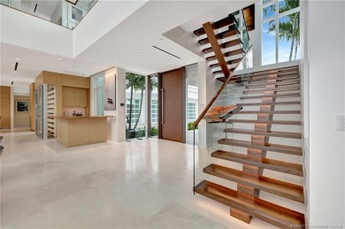 Experience the best of luxury living in this waterfront coastal on Sailfish Point Golf Club, Inc. in Florida - for sale on GolfHomes.com, golf home, golf lot