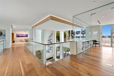 Experience the best of luxury living in this waterfront coastal on Sailfish Point Golf Club, Inc. in Florida - for sale on GolfHomes.com, golf home, golf lot