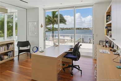 Experience the best of luxury living in this waterfront coastal on Sailfish Point Golf Club, Inc. in Florida - for sale on GolfHomes.com, golf home, golf lot