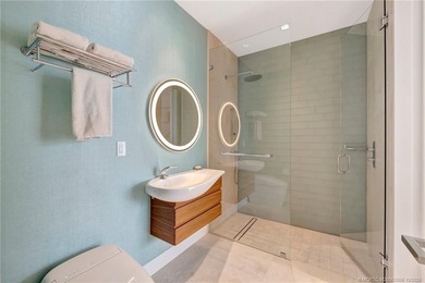 Experience the best of luxury living in this waterfront coastal on Sailfish Point Golf Club, Inc. in Florida - for sale on GolfHomes.com, golf home, golf lot