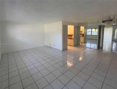 Charming 1BR/1.5BA in the heart of Wynmoor's 55+ Martinique II B on Wynmoor Golf Course in Florida - for sale on GolfHomes.com, golf home, golf lot