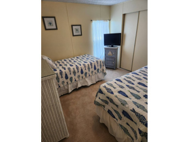 This 2 bedroom / 2 bath is all you need , perfect for the on Spanish Lakes Fairways in Florida - for sale on GolfHomes.com, golf home, golf lot
