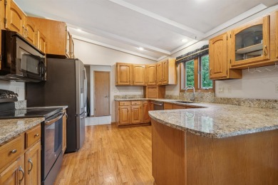 First time on the market! This long-loved, one-owner tri-level on Thunder Hills Country Club in Iowa - for sale on GolfHomes.com, golf home, golf lot