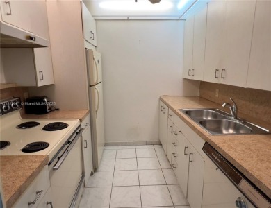 Charming 1BR/1.5BA in the heart of Wynmoor's 55+ Martinique II B on Wynmoor Golf Course in Florida - for sale on GolfHomes.com, golf home, golf lot