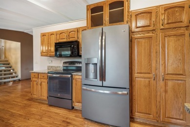 First time on the market! This long-loved, one-owner tri-level on Thunder Hills Country Club in Iowa - for sale on GolfHomes.com, golf home, golf lot