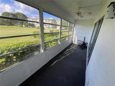 Charming 1BR/1.5BA in the heart of Wynmoor's 55+ Martinique II B on Wynmoor Golf Course in Florida - for sale on GolfHomes.com, golf home, golf lot