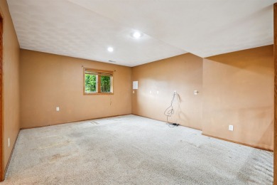 First time on the market! This long-loved, one-owner tri-level on Thunder Hills Country Club in Iowa - for sale on GolfHomes.com, golf home, golf lot
