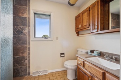 First time on the market! This long-loved, one-owner tri-level on Thunder Hills Country Club in Iowa - for sale on GolfHomes.com, golf home, golf lot