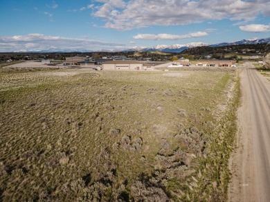 This 1 acre commercial zoned parcel sits in a desirable location on Spring Creek Golf Course in Nevada - for sale on GolfHomes.com, golf home, golf lot