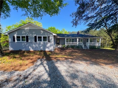 Set on approximately 1.47 acres, this fully remodeled on Cateechee Golf Club in Georgia - for sale on GolfHomes.com, golf home, golf lot