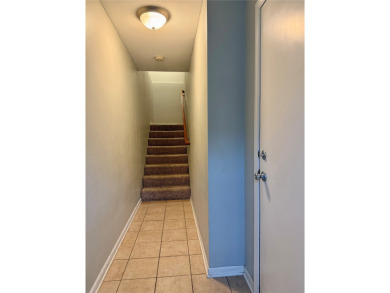 You'll love everything about this 2-bedroom, 2.5-bath townhome on Otter Creek Golf Course in Iowa - for sale on GolfHomes.com, golf home, golf lot