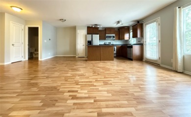 You'll love everything about this 2-bedroom, 2.5-bath townhome on Otter Creek Golf Course in Iowa - for sale on GolfHomes.com, golf home, golf lot