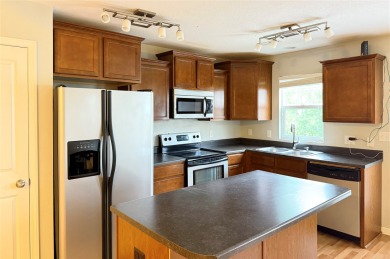 You'll love everything about this 2-bedroom, 2.5-bath townhome on Otter Creek Golf Course in Iowa - for sale on GolfHomes.com, golf home, golf lot