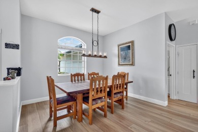 This is the ONE! Elegant and spacious, this 4 bedroom, 3 full on Hammock Creek Golf Club in Florida - for sale on GolfHomes.com, golf home, golf lot